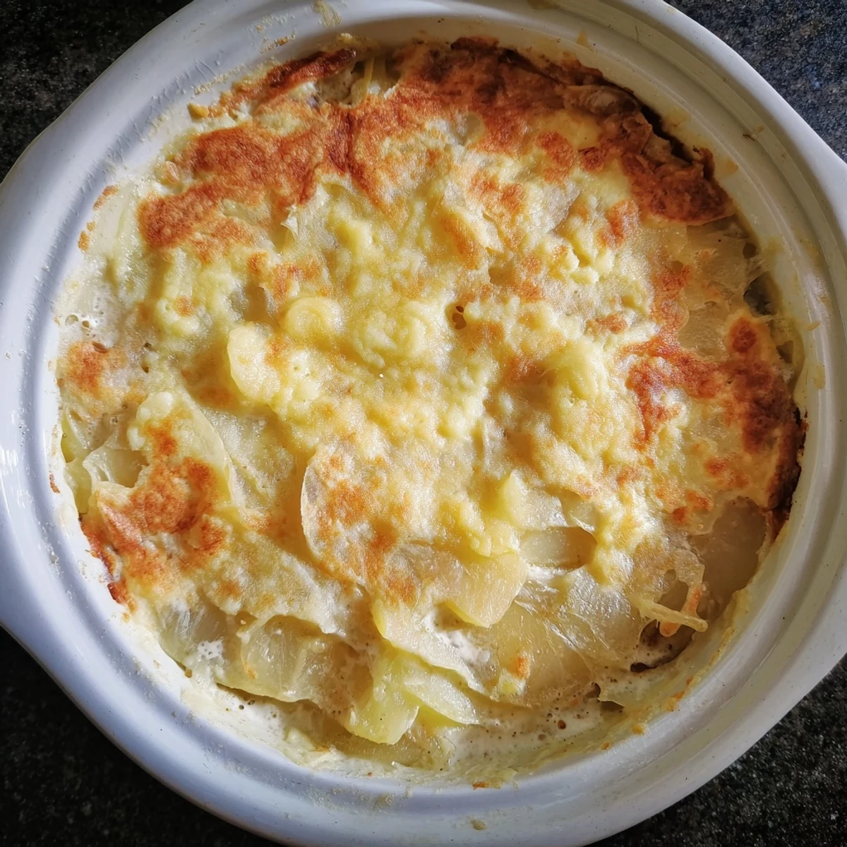 Hearty French onion soup, a comforting classic, features a rich broth and gooey Gruyère with toasted toasty bread.