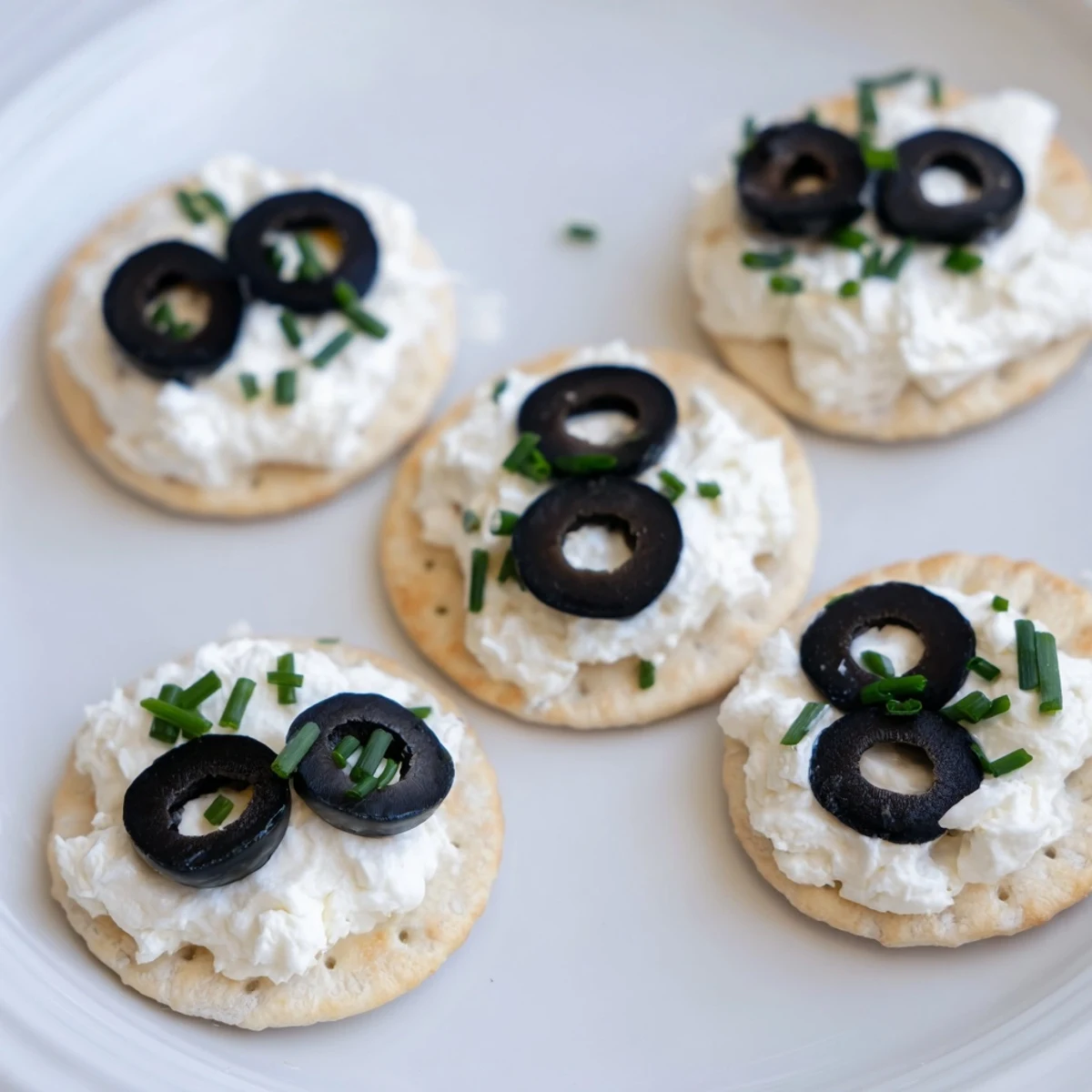 Vibrant Gold Medal Olympic Ring Appetizers with colorful toppings, perfect for a celebration platter.