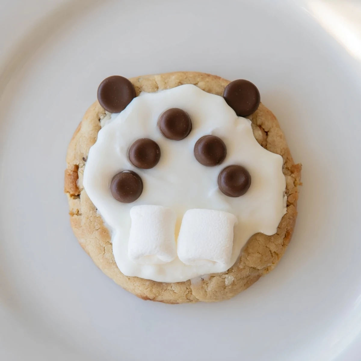 Warm-baked Polar Bear Paw Print Cookies, decorated as fluffy paws and perfect for winter celebrations.