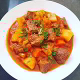 Steam rises from this bubbling Smoked Paprika & Garlic Beef Stew, packed with vegetables and flavor.