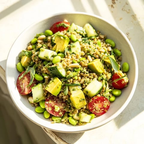 Holiday Glow Green Goddess Protein Pasta Salad, a creamy, vibrant pasta salad, bursting with fresh herbs and colorful veggies.