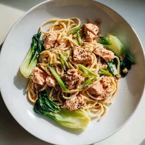 Creamy miso butter salmon pasta, plated beautifully, ready for a delicious, savory dinner.