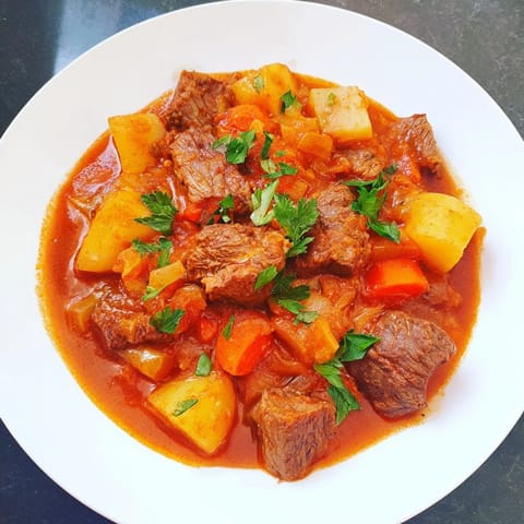 Steam rises from this bubbling Smoked Paprika & Garlic Beef Stew, packed with vegetables and flavor.