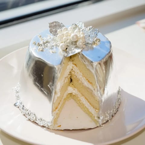 This Diamond Ring Engagement Board features layers of mousse, perfect for a shimmering celebration centerpiece.