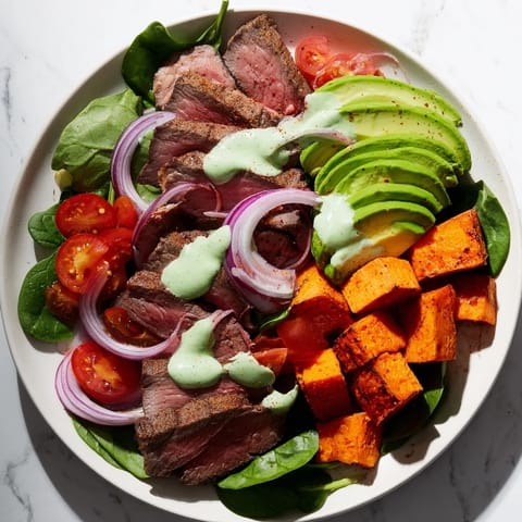 Flavorful Beef Avocado Sweet Potato Bowl: savory beef combined with roasted sweet potatoes, a complete meal.