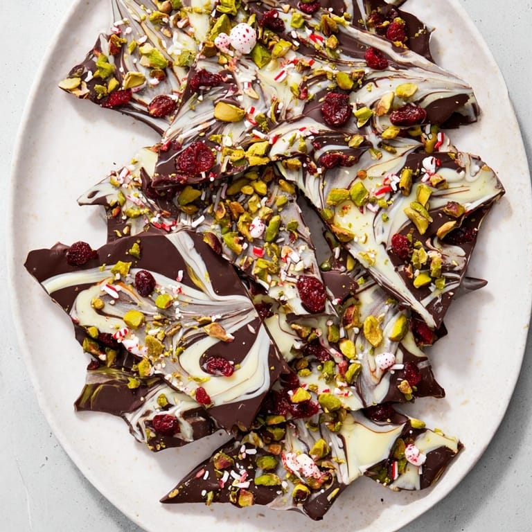 Indulge in this homemade Holiday Bark, a beautiful dessert with crunchy textures and delicious flavors.